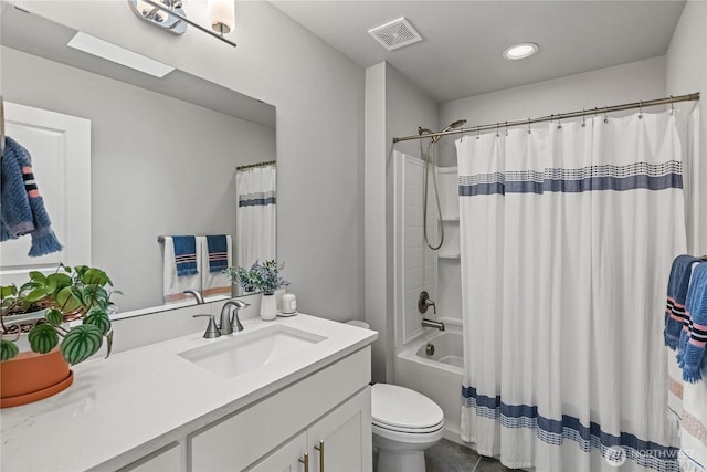 full bath featuring vanity, visible vents, shower / bath combination with curtain, tile patterned floors, and toilet