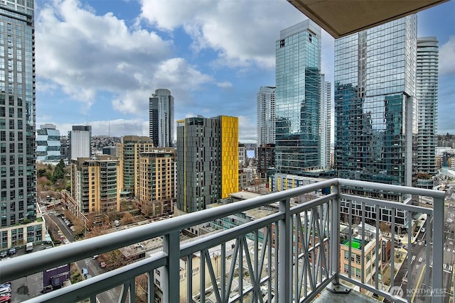 balcony featuring a view of city