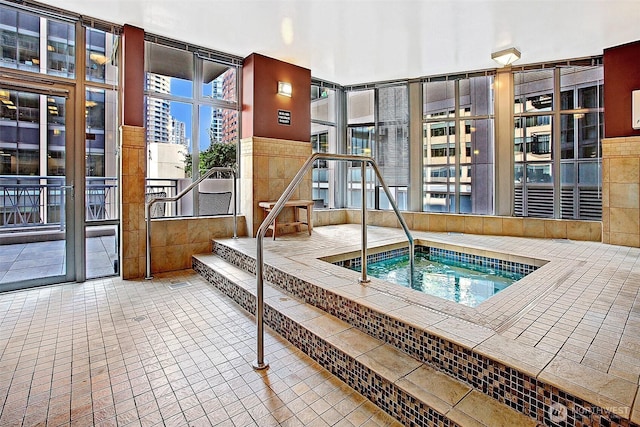 view of pool featuring an indoor in ground hot tub