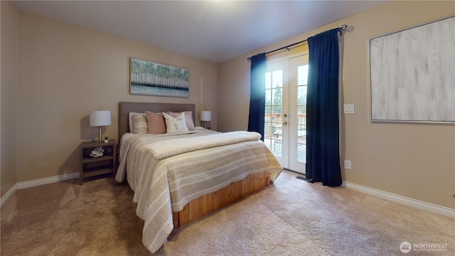 bedroom featuring access to outside, carpet, and baseboards