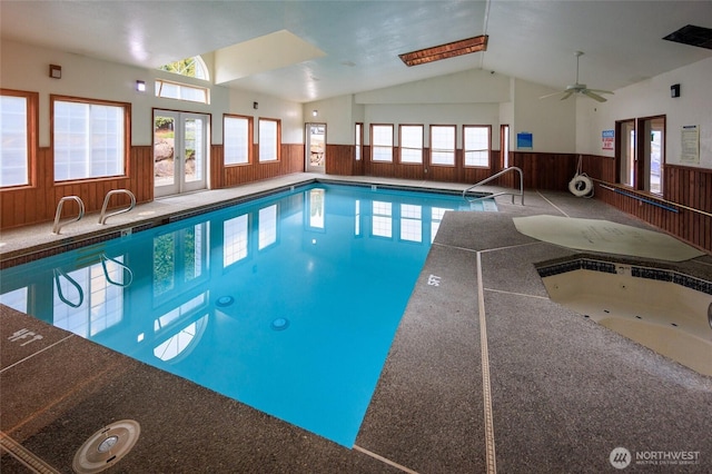 community pool featuring french doors