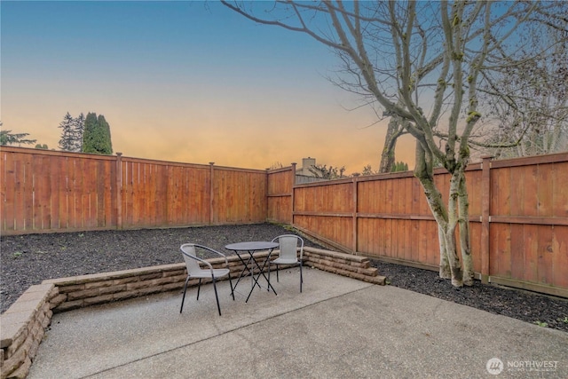 view of patio / terrace featuring outdoor dining space and a fenced backyard