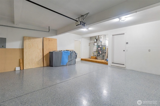 garage with electric panel, a garage door opener, and water heater