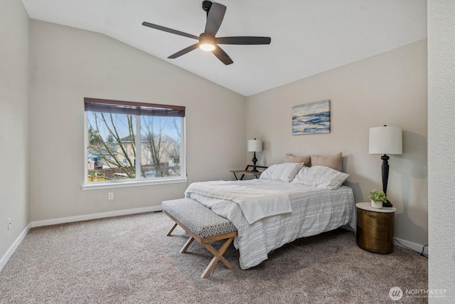 bedroom with vaulted ceiling, carpet, baseboards, and ceiling fan