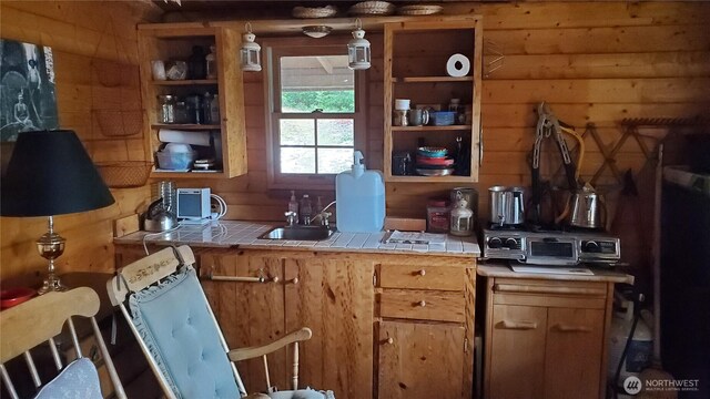 2001 N Dow Mountain Rd, Hoodsport, WA 98548 - kitchen featuring tile counters and a sink