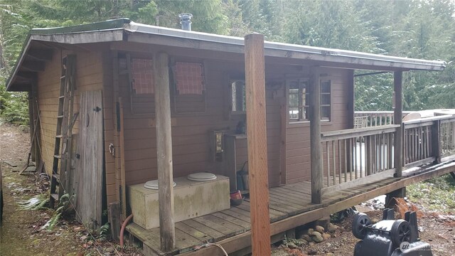 2001 N Dow Mountain Rd, Hoodsport, WA 98548 - wooden deck featuring a view of trees