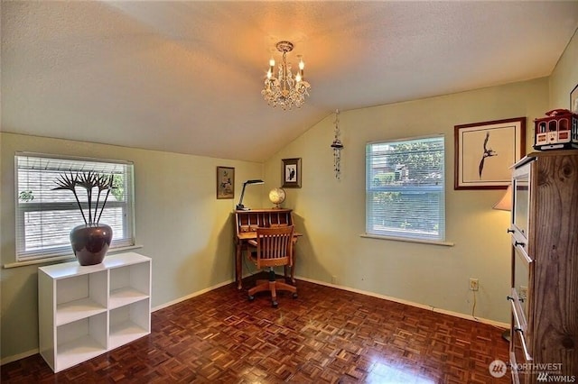 office area with baseboards, lofted ceiling, a textured ceiling, and a chandelier