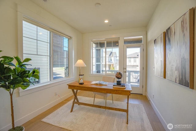 office area featuring recessed lighting, baseboards, and wood finished floors