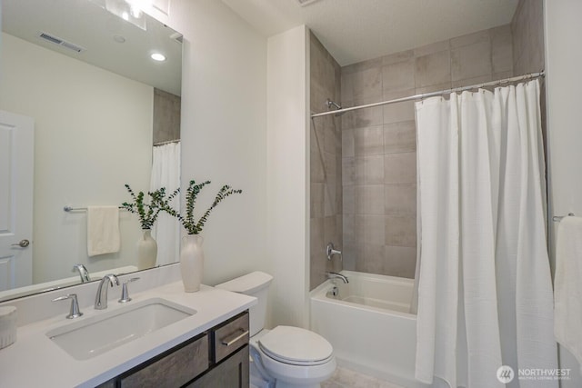 full bath with visible vents, toilet, vanity, and shower / bath combination with curtain