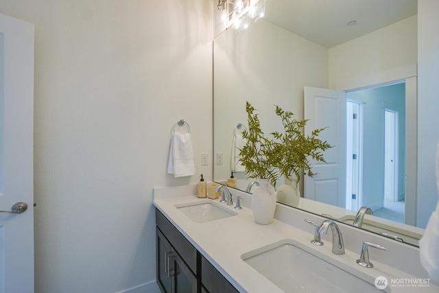 bathroom with double vanity and a sink