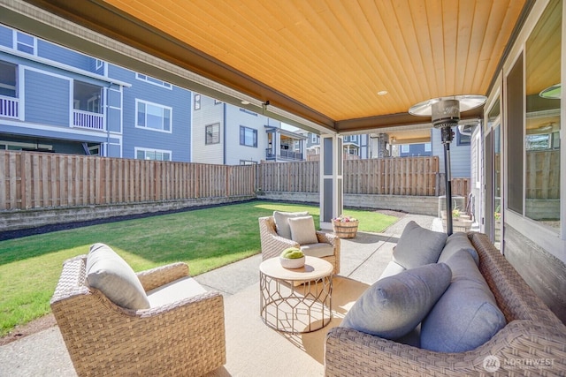 view of patio / terrace featuring an outdoor living space and a fenced backyard