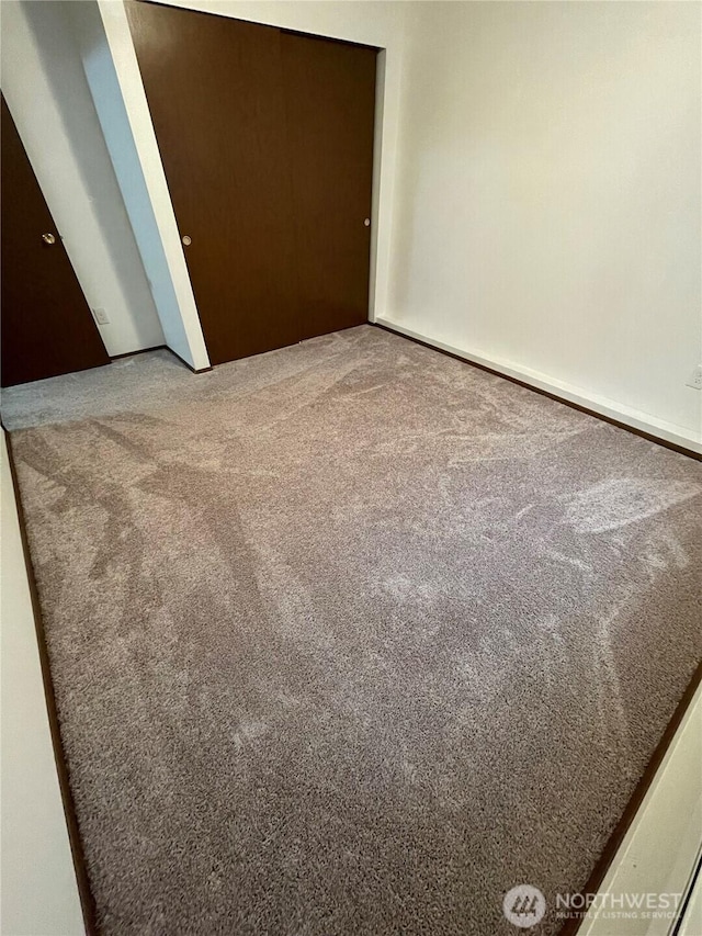 interior space featuring carpet flooring