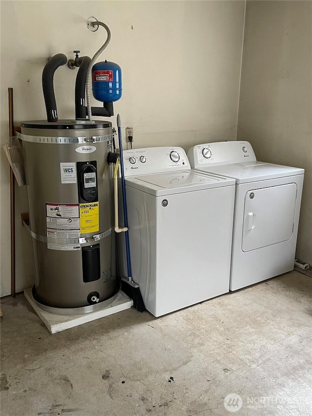 laundry room featuring laundry area, secured water heater, and independent washer and dryer