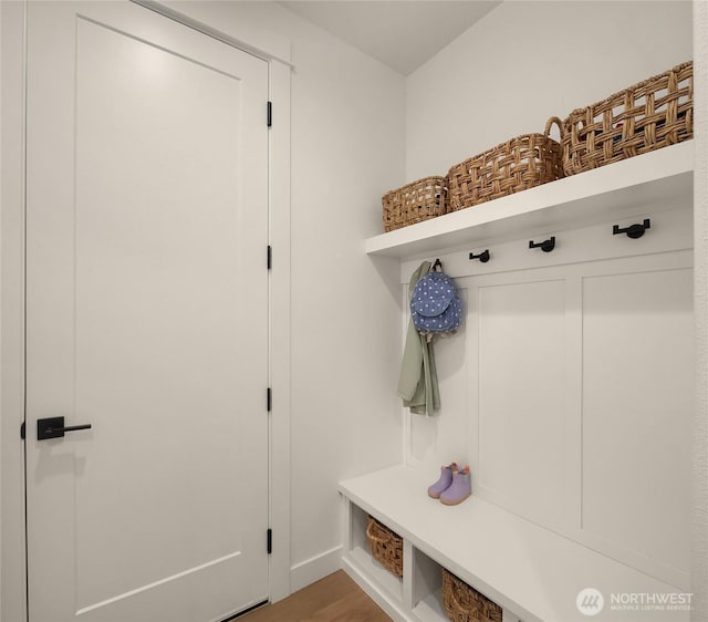 mudroom with wood finished floors