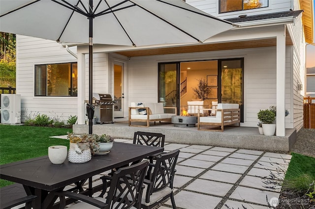 view of patio featuring outdoor dining space, area for grilling, ac unit, and outdoor lounge area