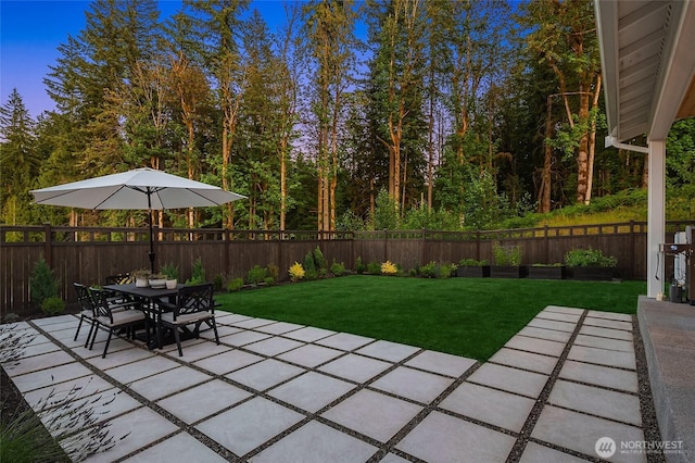 view of patio / terrace featuring outdoor dining area and a fenced backyard