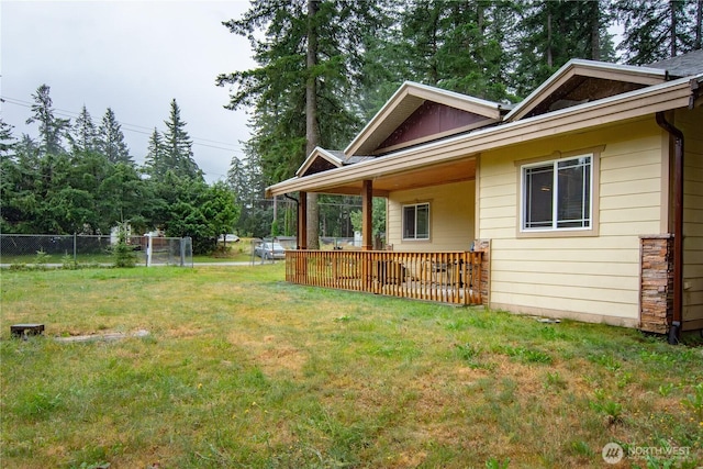 exterior space with a yard and fence