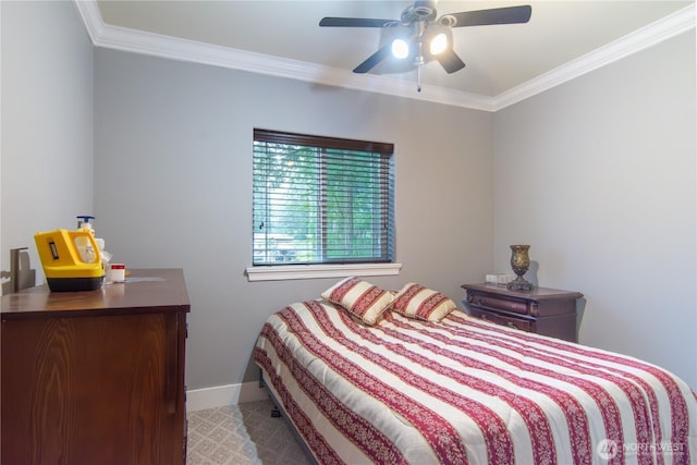 bedroom featuring a ceiling fan, baseboards, and ornamental molding