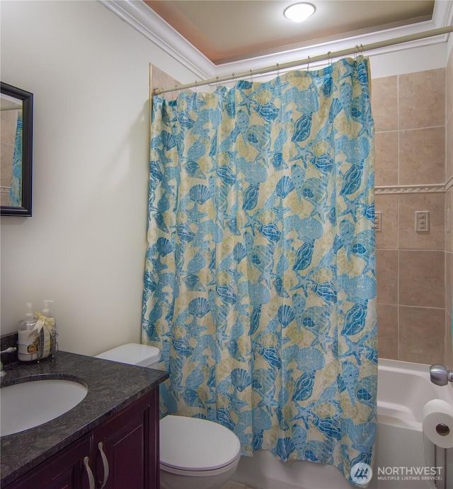 bathroom with toilet, shower / bath combo, and vanity