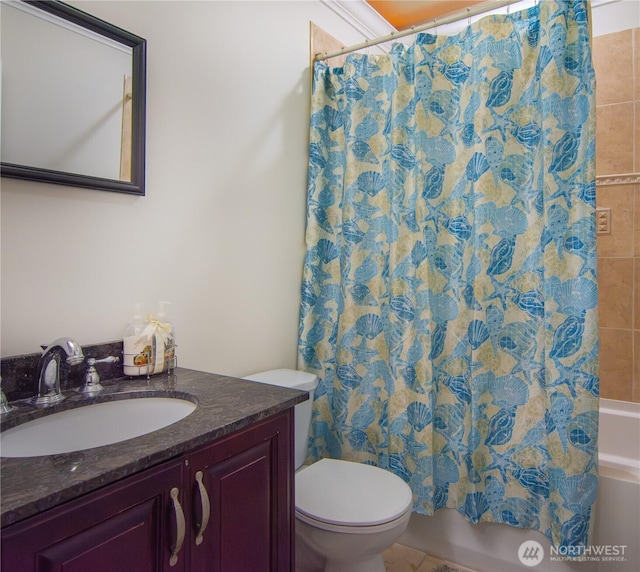 full bathroom featuring vanity, toilet, and shower / tub combo