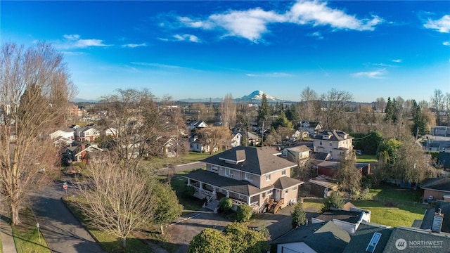 bird's eye view featuring a residential view and a mountain view