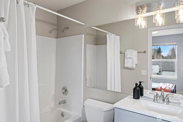 full bathroom featuring toilet, vanity, and shower / bath combination with curtain