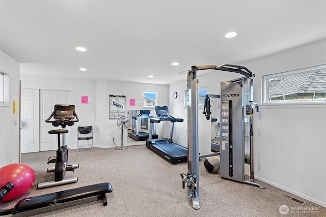 workout area featuring recessed lighting, visible vents, and baseboards