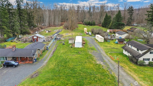 aerial view featuring a forest view