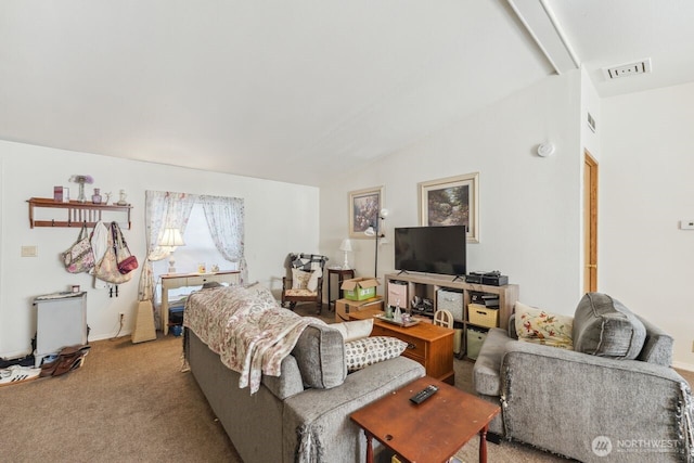 living area with light carpet, visible vents, and lofted ceiling