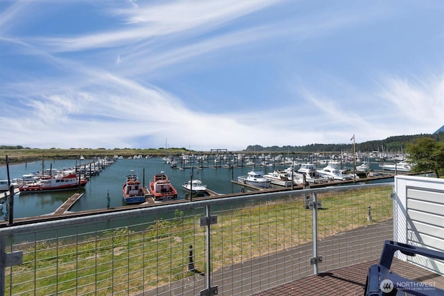 dock area featuring a water view