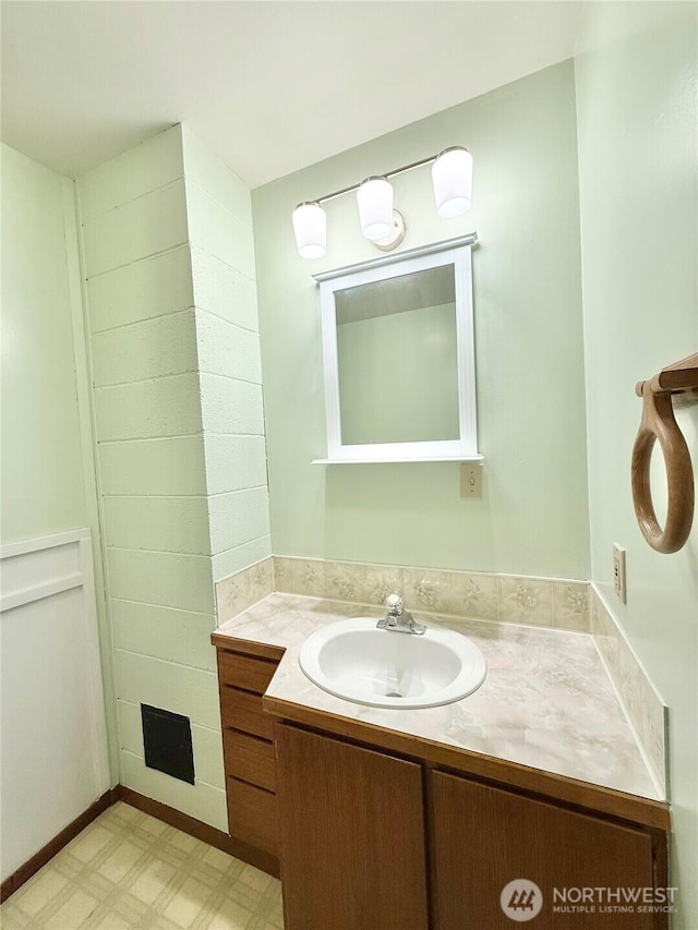 bathroom featuring tile patterned floors and vanity