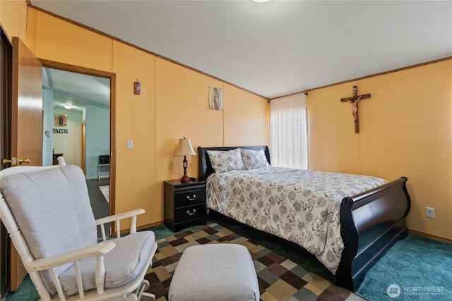 carpeted bedroom featuring crown molding