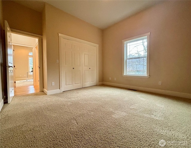 50 Holbrook Ln, Aberdeen, WA 98520 - unfurnished bedroom with a closet, baseboards, visible vents, and carpet flooring