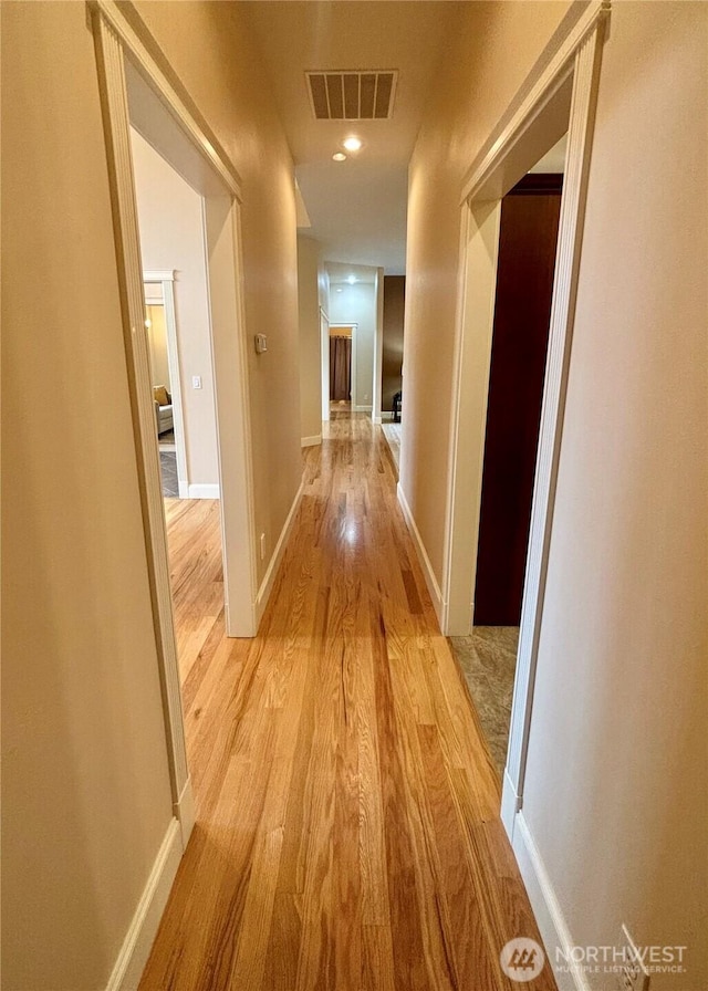 50 Holbrook Ln, Aberdeen, WA 98520 - hallway with baseboards, visible vents, and light wood-type flooring