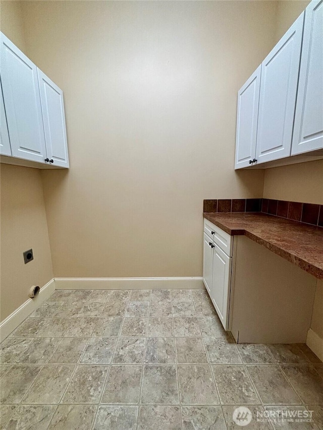 50 Holbrook Ln, Aberdeen, WA 98520 - laundry room with cabinet space, hookup for an electric dryer, and baseboards