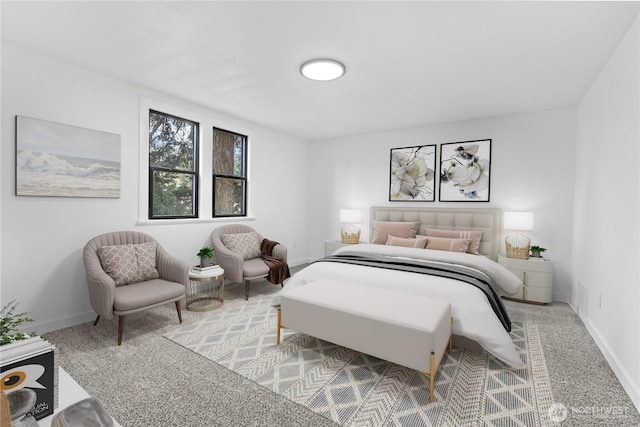 bedroom featuring baseboards and carpet