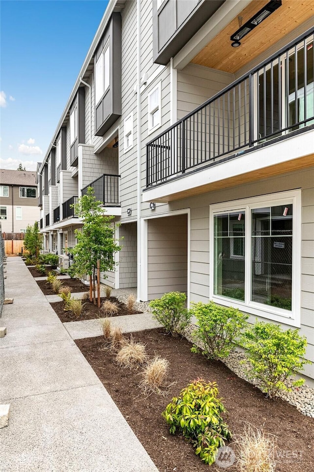 view of building exterior with a residential view