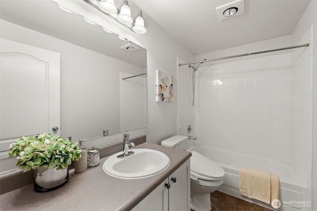 bathroom with vanity, toilet, bathtub / shower combination, and visible vents