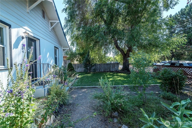 view of yard with fence