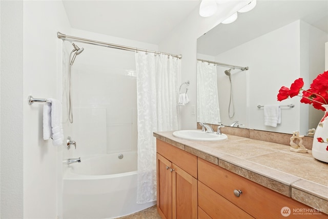 bathroom with vanity and shower / bath combination with curtain