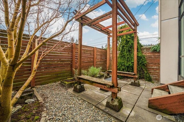 view of patio / terrace with fence