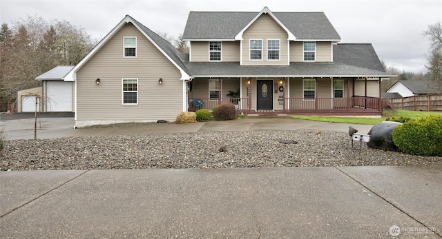 view of front of home featuring an outbuilding and covered porch