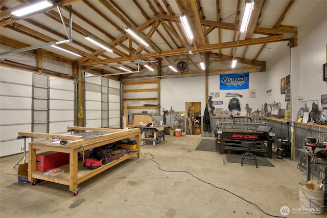 garage with a workshop area