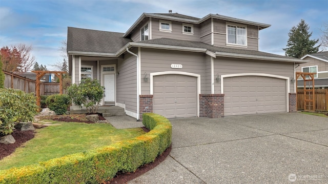 view of front of property with brick siding, fence, concrete driveway, roof with shingles, and a garage