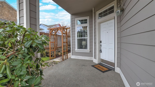 property entrance featuring fence