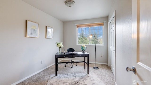 office with carpet flooring and baseboards