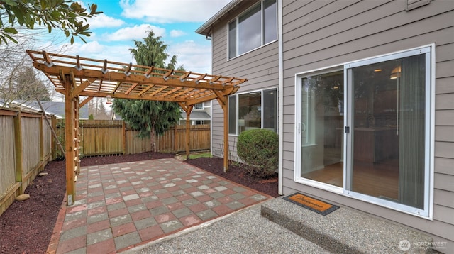 view of patio with a fenced backyard and a pergola