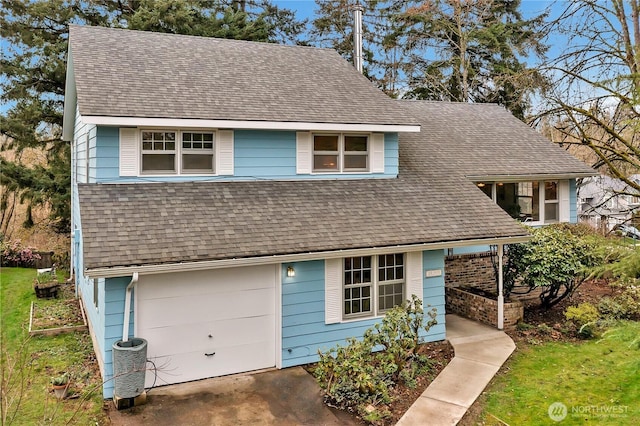 view of front facade with cooling unit and roof with shingles