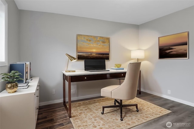 office space featuring baseboards and dark wood finished floors