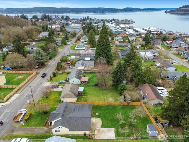 aerial view with a residential view and a water view